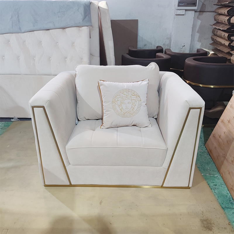 A luxury beige versace sofa set